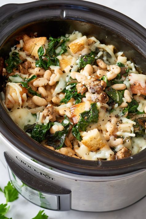 The Best Slow Cooker Recipes for an Office Thanksgiving Potluck Crockpot Potluck, Thanksgiving Dinner For Two, Bread Stuffing, Sausage Spinach, Thanksgiving Potluck, Swiss Chard Recipes, Beans And Sausage, Slow Cooker Stew, Chard Recipes