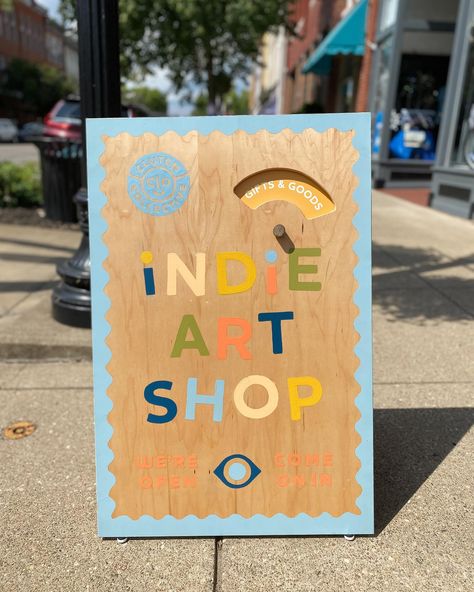 Have you seen our new sandwich board?! 😍 We are in love with this beauty! @a.n.creative came up with the design and hand-painted the sandwich board, which was fabricated by my husband, Nick. We wanted it to be fun, inviting, and cheerful, just like our shop 🙌 The spinning wheel makes it extra fun and lets us promote our artist pop-ups and live music. We think it’s just perfect and are so grateful to @americanexpress and @natlmainstreet for the Backing Small Businesses Grant that funded this ... Sandwich Board Sign, Sandwich Board, Trust In Relationships, Indie Art, Business Grants, Interior Display, Small Business Saturday, Spinning Wheel, Over The Moon