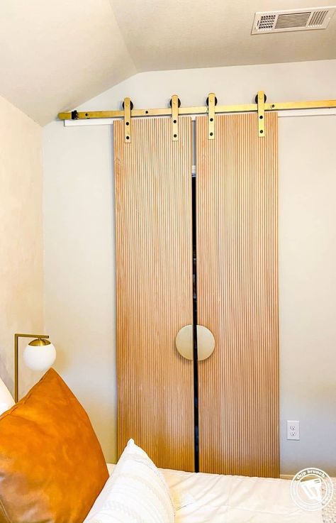 Modern Barn Door Sliding, Interior Door Hardware Modern, Mcm Sliding Door, Modern Double Barn Door, Brass Barn Door Hardware, Mid Century Modern Sliding Door, Pole Wrap Closet Door, Modern Barn Door Closet, Diy Double Doors Interior