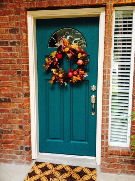 Teal painted front door with red bricks -- the first thing about this house is I knew I wanted a painted front door - the existing was a wood stained door crying for attention.  After having paint samples taped to the door for a month (that's right!), I finally choose a color.  It's a pop of happy!  The color is Behr Ultra Verdant Forest - purchased at Home Depot, exterior flat.  You can find more ideas on my Facebook page - Calling the Hill Country Home. Orange Brick Houses, Teal Front Doors, Best Exterior Paint, Blue Front Door, Front Door Paint Colors, Orange Brick, Stained Doors, Teal Paint, Door Paint Colors