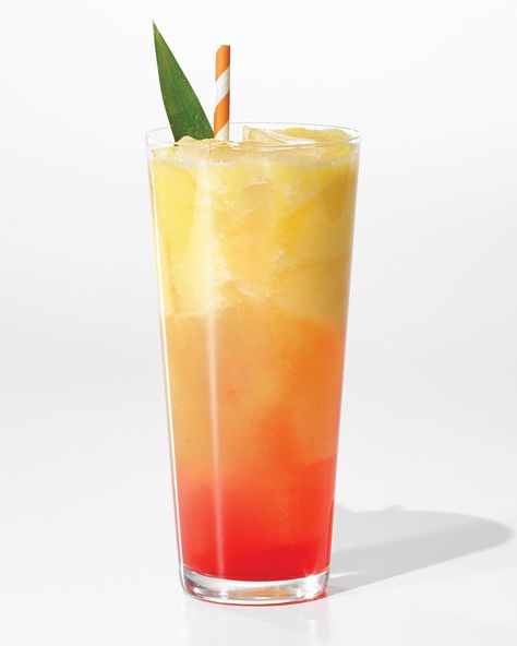 A basic brunch turns into a tropical party when you serve this mouthwatering ombre mocktail. Guava Mocktail, Luau Party Desserts, Aloha Party Punch, Tiki Cake, Grenadine Syrup, Palm Tree Fruit, Bbq Pulled Pork Sandwiches, Caribbean Party, Hawaiian Cake