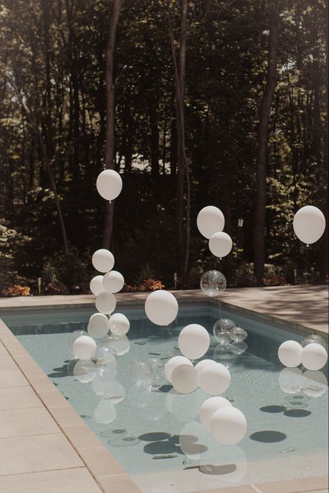 Wedding
Wedding pool decor 
Pool decorations 
Pool balloons Pool Decor Balloons, Wedding Pool Balloons, Balloons In A Pool, Summer Pool Wedding, White Balloons In Pool, Backyard White Party, Pool Engagement Party Decor, Hamptons Party Decor, Pool With Balloons