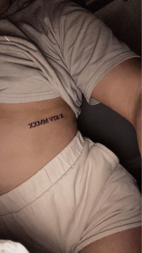 Rib Tattoo Roman Numeral, Rib Roman Numeral Tattoo, Underboob Rib Tattoo, Tattoo Roman Numeral, Roman Numeral Birthday, Roman Numeral Tattoo, Numeral Tattoo, Roman Numeral Tattoos, Ribcage Tattoo