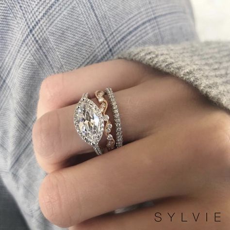 A gorgeous marquise cut engagement ring that's perfect for the holiday season! ❄️ Check out Greenwich St. Jewelers for this gorgeous set from sylviecollection.com!  (Style shown: SY395) #Diamonds #Marquise #EngagementRings #Engaged #SylvieCollection #SomethingSylvie #Holidays #Proposals Asscher With Baguettes, Marquise Cut Engagement Ring, Diamond Bridal Ring Sets, Plain Wedding Band, Marquise Diamond Ring, Engagement Rings Marquise, Engagement Ring Shapes, Rose Gold Wedding Bands, Jewelry Style