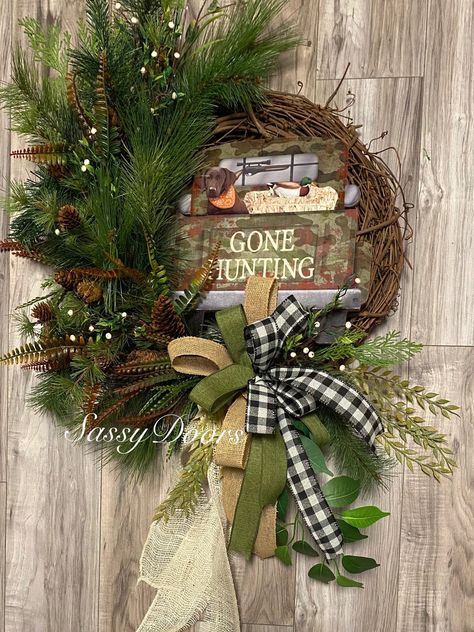 Dog Wreath, Hunting Wreath, Woodland Wreath, Cabin WreathsThis camouflage truck hunting door decor is sure to delight the enthusiastic outdoorsman. This woodlands hunting design is resting on a 18” grapevine wreath. The sign depicts love for the outdoors while it rest in a variety of pines and pi Hunting Wreath, Dog Wreaths, Fishing Wreath, Sports Wreath, Woodland Wreath, Antlers Decor, Sports Wreaths, Hunting Design, Dog Wreath