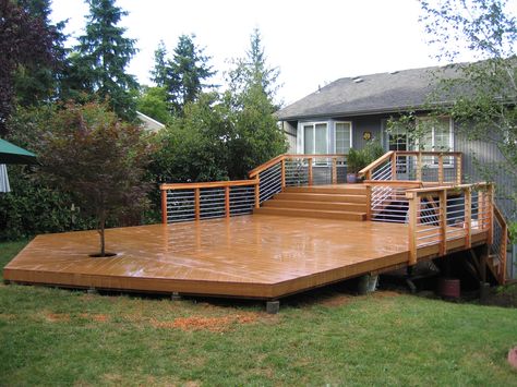 Custom split level cedar deck with stairs. Lots of room for entertaining! Raised Deck To Patio Transition, Split Level Deck Ideas, Backyard Wood Deck, Split Level Deck, Wood Deck Ideas, Deck With Stairs, Backyard Deck Ideas On A Budget, Deck Ideas On A Budget, Deck Options