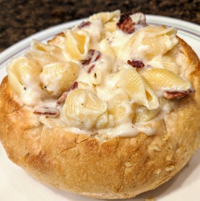 Pasta Bread Bowls, Pasta In A Bread Bowl, Chicken Alfredo Pasta Bread Bowl, Bread Pasta Bowls, Pasta In Bread Bowl, Bread Bowl Spaghetti, Bread Bowl Pasta, Chicken Alfredo Bread Bowls, Chicken Alfredo Bread Bowl Recipe