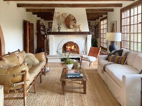 PROPERTY COLLECTIVE on Instagram: “@laurenliess’ cozy living room is the perfect spot to spend a rainy day. We’re on our way, LL! ⠀⠀⠀⠀⠀⠀⠀⠀⠀ #interiorinspo #loveyourhabitat…” Spanish Tudor House, Mediterranean Homes Interior Design, Mediterranean Homes Interior, Spanish Mediterranean Homes Interior, Sparkle Jump Rope Queen, Mediterranean Home Interior Design, Spanish Revival Interior, Spanish Haciendas, Floor Fireplace