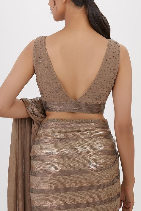 Buy Nakul Sen Grey Chiffon Stripe Pattern Saree With Sleeveless Blouse Online | Aza Fashions Lehnga Blouse Designs Sleeveless, Blouse Designs For Sequin Saree, Lehriya Blouse Designs Latest, Trendy Blouse Designs Sleeveless, V Neck Sleeveless Saree Blouse, Back V Neck Blouse Design, Stylish Blouse Design Unique Back 2024, Sleeveless Blouse Designs For Silk Saree, Sleeve Less Blouse Designs