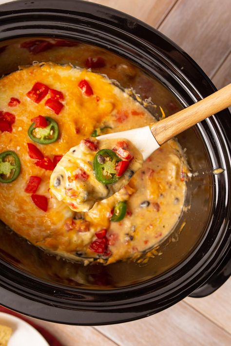 Crockpot Mexican chicken is full of flavorful ingredients including black beans, Rotel tomatoes, chicken, and loads of cheesy goodness all slowly cooked to melty perfection. Crockpot Mexican Chicken, Crockpot Mexican, Slow Cooker Mexican Chicken, Slow Cooker Mexican, Mexican Chicken Casserole, Keto Crockpot, Raw Chicken Breast, Chicken Recipies, Mexican Casserole