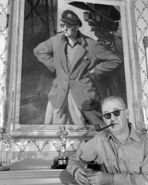 Prolific film director, John Ford, standing in front of a portrait of himself and one of his six Oscars🏆 Are you a fan of Ford's westerns? . . . . . . . . #johnford #oscars #johnwayne #oldhollywood #history #1930s #1940s #oldphotographs #vintagefashion #smokeeveryday #pipesmokingcommunity #handmadepipes #pipemaker #pipemaking #tobaccopipe #tobaccopipes #tobacciana #pipelover #pipeculture #igpc #smoking #pipe #smokingpipe #castellopipes #briarpipe #smokingpipes #artisanpipes #pipecommunity #pipe The Quiet Man, Grapes Of Wrath, Fritz Lang, Wyatt Earp, John Ford, The Searchers, Best Director, Movie Director, Irish Heritage