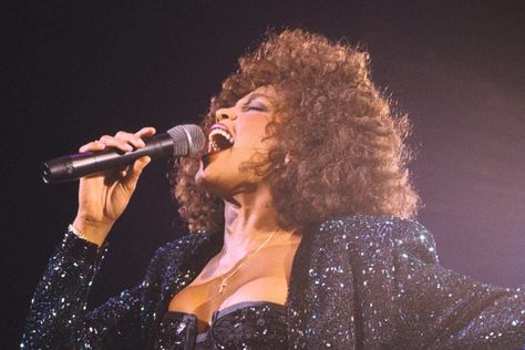 British actress Naomi Ackie is set to portray Whitney Houston in biopic "I Wanna Dance with Somebody." The film will be released in 2022. Whitney Houston, On Stage, Houston, A Woman, Singing, Songs, Black