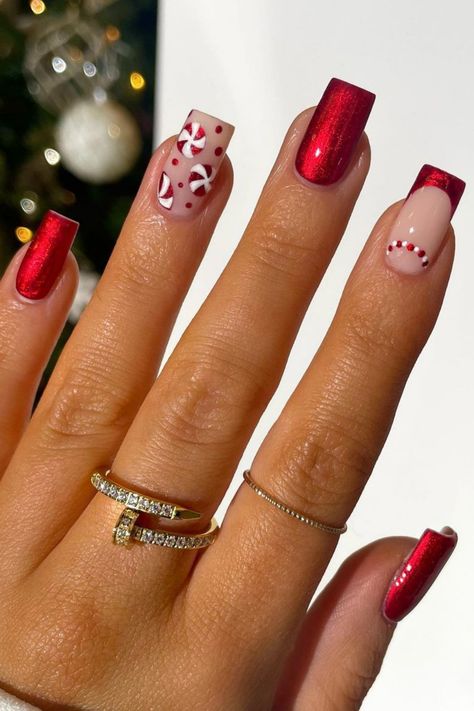 A festive Christmas nail design on short square-shaped nails featuring sparkly red polish, candy cane patterns, and red dot accents. Short Square December Nails, Christmas’s Nails Short, Square Nails Short Christmas, Aesthetic Nails For Winter, Clear Christmas Nails Acrylic, Cute Holiday Nails Short, Nail Ideas Christmas Red, December Nails Christmas Red, Christmas And New Year Nails Short