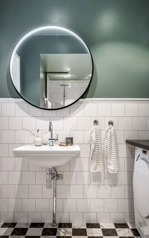 A half-tiled bathroom with a green painted upper half and a black-and white floor Half Wall Paint Bathroom, Tiled Half Bath, Bathroom With Tile Halfway Up Wall, Half Tiled Bathroom Ideas, Half Tile Wall Bathroom, Bathroom Half Tiles Half Paint, Tile Half Way Up Bathroom Wall, Half Tile Bathroom, Half Bath Tile Wall