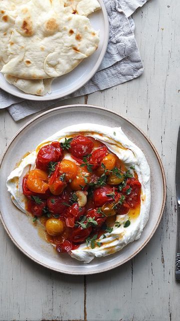 Steph Taylor on Instagram: "Whipped goats cheese with confit tomatoes + garlic Hello hello, it’s been a busy few weeks with lots of freelance work (alongside mum duties!) and i’m oh so aware I haven’t been posting as much in recent months! The good news is i’ve finally been filming and shooting some new recipes to share on here over the coming weeks. First up is this creamy goats cheese and confit tomatoes situation which I could happily mop up daily! There’s a lot of whipped feta around but I prefer to use soft goats cheese, it’s creamier, silkier and lighter in my view. As always do let me know if you give it a try! Serves 2 Ingredients: 1 pack soft rindless goats cheese 1 heaped spoonful cream cheese 1 tbsp greek yoghurt Cherry tomatoes Handful of garlic cloves Olive oil Se Confit Tomatoes, Goat Cheese Appetizer, Whipped Goat Cheese, Goat Cheese Recipes, Goats Cheese, Whipped Feta, Tasty Foods, Freelance Work, Hello Hello