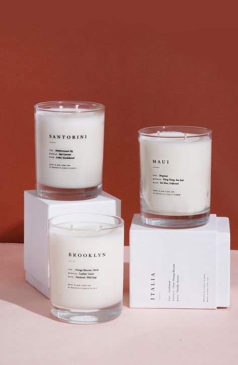 What it is: An elegant double-wick soy candle, presented in a screenprinted glass vessel, that fills any room in your home with scent.Fragrance story: Brooklyn Escapist is inspired by late nights lingering with friends in aged-leather booths of bustling Brooklyn cocktail bars, live jazz serenading the room, sipping drinks infused with exotic ingredients like wild sage, cassis and orange blossom.Style: Warm and spicy.Notes:- Top: Orange blossom, neroli.- Middle: Leather, cassis.- Base: Patchouli, Brooklyn Cocktail, Candle Shoot, Candle Photography Ideas, Brooklyn Candle Studio, Minimalist Candles, Scent Bars, Candle Bar, Live Jazz, Work Stickers