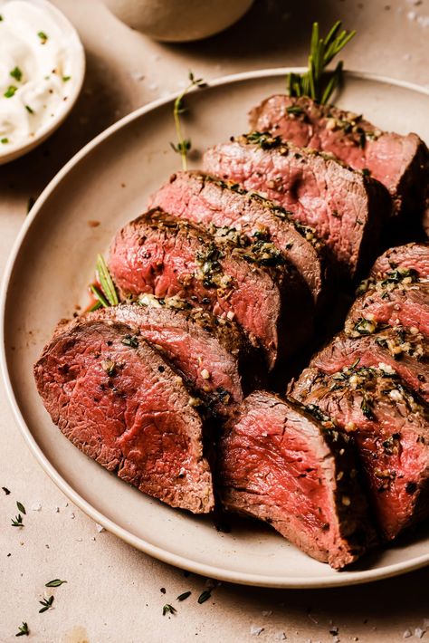 Garlic Butter Beef Tenderloin is seared to perfection, topped with garlic butter, and finished in the oven. Simple, elegant, and delicious. Tenderloin Roast Recipe, Butter Beef, Whole Beef Tenderloin, Bacon Wrapped Pork Tenderloin, Beef Tenderloin Recipes, Garlic Beef, Bacon Wrapped Pork, Tenderloin Roast, Healthy Thanksgiving Recipes