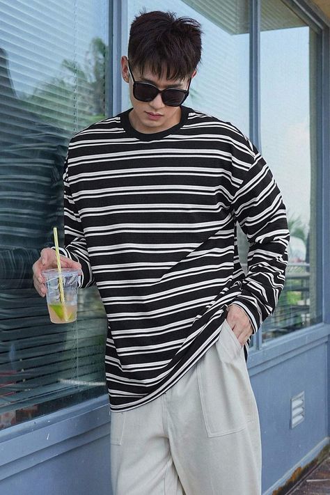 This black-colored striped oversized crew neck t-shirt is designed for men and is made of polyester. It has an long sleeve. #men #tshirt #oversized #koreanfashion Mens Striped Tshirt Outfits, Striped Tshirt Outfits, Polo Outfit Men, Striped Tshirt Men, Long Sleeves Polo, Oversized Long Sleeve Shirt, Polo Outfit, Long Sleeve Men, Tshirt Oversized