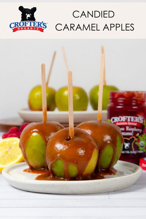 Delight in the magic of fall with Candied Caramel Apples—a perfect recipe for Halloween parties. Create easy, irresistible treats that capture the essence of autumn. Elevate your celebrations with this fun, Halloween-themed food. Get cooking and savor the sweet moments of the season! 🍎🎃 Halloween Caramel Apples Recipe, Caramel Dipped Apples, Apple Lollipops, Caramel Apple Lollipops, Fall Caramel Apples, Raspberry Caramel, Caramel Apples Halloween, Apple Pops, Dipped Apples