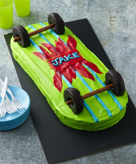 Chocolate mini-doughnuts and pretzel rods make this skateboard cake ready to roll! Easy to personalize with your kiddo's favorite color and cake flavor, it makes a fun birthday cake for an on-the-go little. Skateboard Cake, Skateboard Birthday Party, Skateboard Party, Skateboard Birthday, Chocolate Doughnuts, Mini Doughnuts, Santa Cruz Skateboards, Birthday Treat, Pretzel Rods