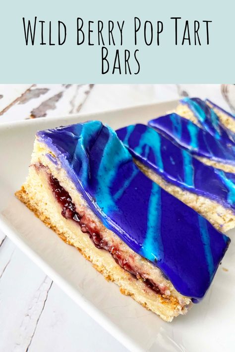 You know the wild berry pop tarts? Well, this is the cookie bar version of them! Thick cookie dough, mixed berry filling, and bright and colorful frosting! TheSkinnyFork.com | Skinny & Healthy Recipes Wild Berry Poptarts, Fourth Of July Baking, Wildberry Poptart, Pop Tart Cake, Berry Filling, Berry Pop, Mixed Berry Jam, Poptart Recipe, Sweet Pies