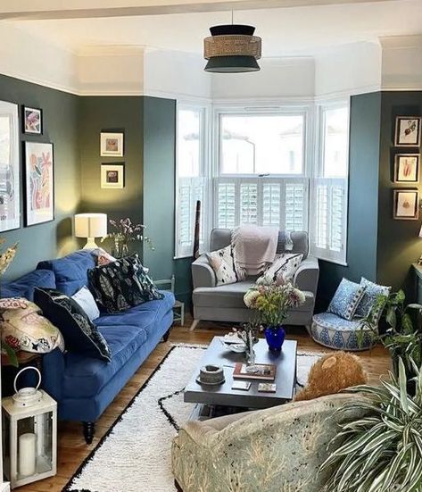 Contrasting Sofas Living Room, Green Walls Living Room Blue Sofa, Green Grey Walls, Cosy Snug Room Ideas, Mixed Furniture, Room With Green Walls, Green Living Rooms, Navy Sofa Living Room, Blue And Green Living Room