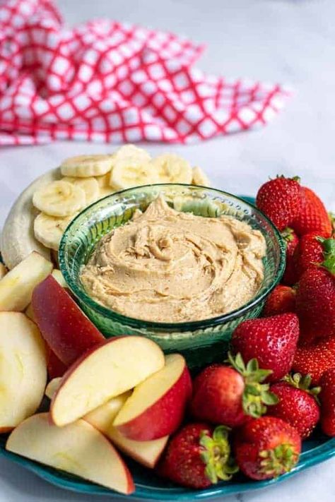 A perfect snack, this delicious whipped Peanut Butter Fruit Dip is only 4 ingredients; peanut butter, yogurt, honey, and cinnamon. Your family will LOVE it. Peanut Butter Fruit Dip, Greek Yogurt Fruit Dip, Peanut Butter Yogurt Dip, Yogurt Fruit Dip, Easy Fruit Dip, Whipped Peanut Butter, Butter Fruit, Peanut Butter Dip, Peanut Butter Yogurt