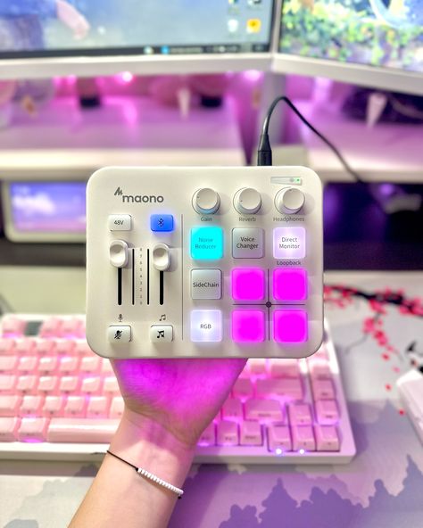 Have you guys checked out this audio mixer from @maonoglobal yet?! - This Maonocaster G1 NEO Audio Mixer has been my go-to every single day I play games! My favorite features are being able to mute my music easily and it can mute my microphone!! - With such a sleek design with vibrant RGB lights. @maonoglobal did an amazing job with this product! How can find it linked in my bio! 🛍️ - ❀ You can find everything from my setup, linked in my bio!! ⚘ - 🅃🄰🄶🅂 ──❀*̥˚───❀*̥˚─┐ - Cozy desk •°. Gamer ... Streaming Aesthetic, Pink Setup, Aesthetic Tech, Tech Setup, Gamer Aesthetic, Cozy Gamer, Ear Monitors, Gamer Stuff, Cozy Desk