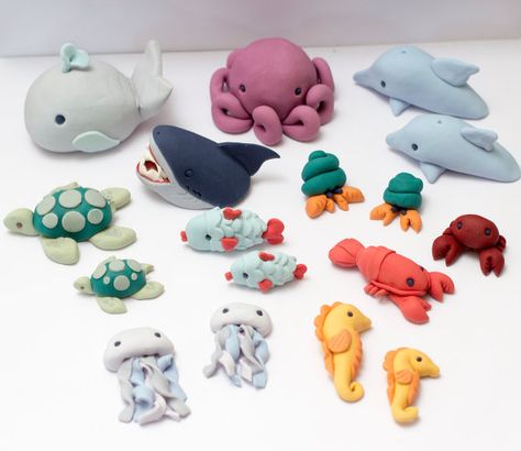 Fondant sea creature cake toppers  Ready to by SeasonablyAdorned Sea Creature Cake, Fondant Unicorn Cake Toppers, Underwater Birthday, Nemo Cake, Sea Cake, Clay Pen, Faux Leather Shirt, Ocean Cakes, 75 Medium