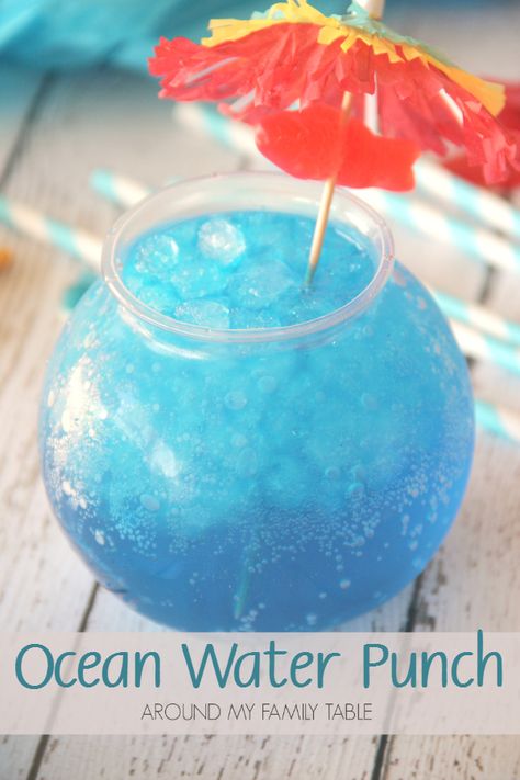 This copycat Ocean Water recipe is different than most of the ones I've seen online. My Ocean Water Punch is closer to the real thing and it's a whole lot easier too! Ocean Water Drink Alcohol Recipe, Ocean Water Alcoholic Drink, Kids Fishbowl Drink, Fishbowl Recipes, Fishbowl Drink Recipe, Ocean Water Punch, Ocean Treats, Ocean Water Recipe, Ocean Water Drink