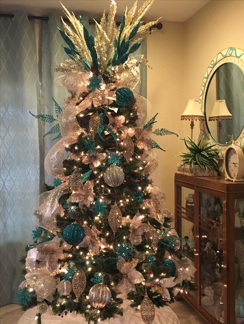 Teal Christmas tree Decorated by Mindy Meyersick Blue And Silver Christmas Tree, Teal Christmas Tree, Turquoise Christmas Tree, Blue And Silver Christmas, Christmas Tree Decorated, Teal Christmas, Peacock Christmas, Turquoise Christmas, Christmas Tree Decorating Themes