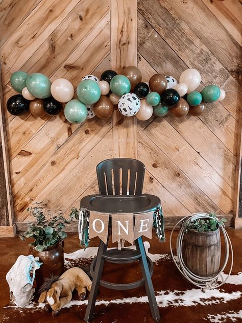 Wanted to share how we decorated for our son’s “first rodeo” party for his first birthday! Could totally go with “holy cow i’m one” theme as well! First Birthday Themes Rodeo, Herd You Were One Birthday, 1 Year Cowboy Birthday, Western Theme One Year Old Party, Actually This Is My First Rodeo Birthday, Cowboys First Birthday, Longhorn Birthday Party, How Cow Im One Birthday, Cowboys First Rodeo Birthday