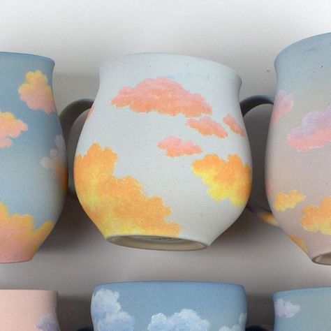 HEDY YANG CERAMICS on Instagram: "Hi all my beautiful new faces!!!💕 cloud mugs have been the most requested/hardest work for me to keep in stock for YEARS now , and preorders have been such a daunting thing for me to take on but 2024 is the year!!!!! I feel ready for the challenge, so keep an eye out for my email blast, I’ll open preorder spots for cloud mugs very very soon but here’s the general gist of how it’ll work: 

☁️ you can pick from 5 different mug shaped, and 5 different sky colors 
☁️ clouds will be painted by me, I won’t be taking special requests on how you want your clouds painted because I will literally fall apart if I have to keep track of that as well lmao 
☁️ all mugs will be $250 each before shipping, I will unfortunately be raising my prices after this round of order Cloud Pottery Painting, Ceramic Clouds, Cloud Mug, Painting Pottery, Pottery Inspo, Email Blast, Sky Color, Cloud Painting, Pottery Painting