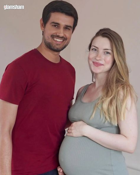 On July 9, 2024, YouTuber Dhruv and his wife Juli shared a post on Instagram announcing that she is pregnant. In the first photo, Juli wore a teal bodycon dress and looked radiant as she cradled her baby bump. Dhruv shared the happy news with excitement. #glamsham #dhruv #dhruvrathee #pregnancy #india #indianyoutuber [ Dhruv Rathee, Pregnancy, YouTube, Youtuber, India ] Dhruv Rathee, Pregnancy Congratulations, Happy News, Indian Celebrity, Vedic Art, Expecting Parents, July 10, Family Goals, Baby Bumps