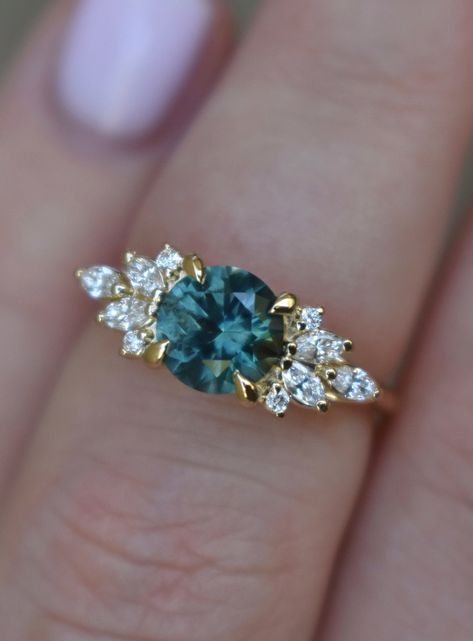 Teal Green Montana Sapphire Engagement Ring W/ Marquise Diamonds 14K Yellow Gold,teal Sapphire Cluster Engagement Ring,blue Green Sapphire - Etsy Australia Engagement Ring Nature, Blue Green Sapphire Ring, Montana Sapphire Engagement, Montana Sapphire Engagement Ring, Nature Engagement Ring, Green Sapphire Engagement, Green Sapphire Engagement Ring, How To Wear Rings, Marquise Diamond Engagement Ring