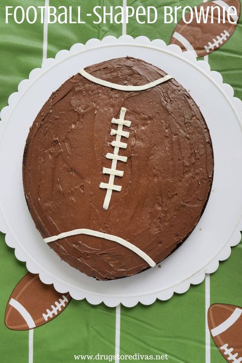 If you’re looking for dessert for your football party, this Football-Shaped Brownie is it. It’s made from a brownie mix in a round cake pan. Football Party Food Ideas, Appetizers And Dips, Football Brownies, Recipes For Game Day, Football Party Snacks, Football Party Foods, Store Bought Frosting, Football Crafts, How To Make Brownies