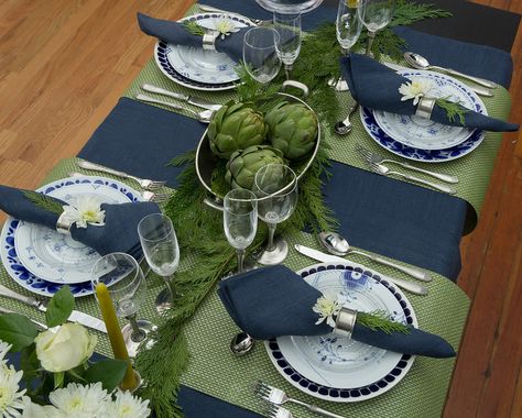 The last of my holiday guest post series for the Didriks blog I call a  Serene New Year’s table. This is a table intended for adult gatherings.  You probably have noticed that the combination of navy and green colors has  been used in fashion for the last few seasons and I think it is still fresh  to the eyes. With the white flowers, it also brings in a slight vibe of  winter. This color scheme mixed with Italian pewter tableware gives this  table the serene elegance for a more formal party ... Green And Navy Table Setting, Blue Green And White Party Decorations, Blue Green Table Setting, Blue And Green Table Setting, Navy Room Decor, Jars Ceramics, Blue Place Settings, Navy Tablecloth, Green Table Settings