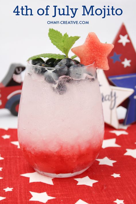 There's no better way to celebrate the Fourth of July than with a patriotic cocktail in hand. The 4th of July Mojito is the perfect drink, to celebrate the holiday with family and friends. This refreshing cocktail is made with red, white and blue ingredients, making it the perfect patriotic drink. Like the traditional mojito, this cocktail is made with rum, mint, club soda and the berries give you the red, white and blue spirit! Enjoy this Fourth of July drink! Powdered Peanut Butter Recipes, July Cocktails, Patriotic Drinks, Fourth Of July Drinks, Patriotic Cocktails, 4th July Food, 4th Of July Cocktails, Powdered Peanut Butter, Blue Spirit