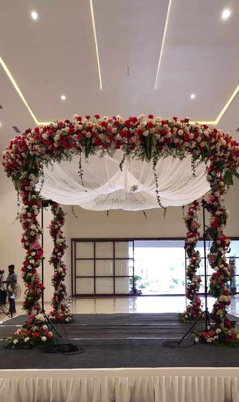 Photo By Blooming Flower Events - Decorators Banquet Hall Mandap Decor, Simple Muhurtham Stage Decoration, Wedding Auditorium Decorations, Flower Gate Decoration Wedding, Wedding Gate Decoration Indian, Simple Mandap Design, Simple Mandap, Wedding Entrance Decoration, Entrance Decoration Ideas