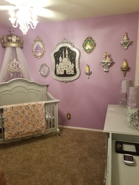 Fit for a princess,  so many pieces incorporated in this nursery from our daughters wedding. So much meaning and love in this room. Princess Mobile Nursery, Disney Castle Nursery Theme, Disney Princess Nursery Baby Girl, Princess Theme Nursery Ideas, Pink Disney Nursery, Disney Princess Room Decor Ideas, Baby Girl Princess Nursery, 90s Nursery Theme, Disney Princess Baby Room