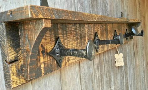 Rustic coat rack made from pallet wood and railroad spikes. Railroad Spike Ideas, Coat Rack With Railroad Spikes, Railroad Spike Toilet Paper Holder, Barnwood Coat Rack, Railroad Spikes Crafts, Railroad Spike Cabinet Handles, Railroad Spike Art, Railroad Spike Coat Hook, Rustic Coat Rack