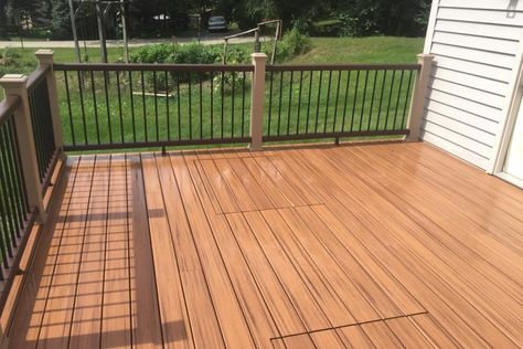 Trex® Tiki Torch Deck with Access Panels for Septic System Oakwood Hills Tiki Torch Trex Decking, Trex Island Mist Deck Ideas, Trex Deck Designs, Biscayne Trex Deck, Trex Deck Coastal Bluff, Trex Woodland Brown Deck, Access Panels, Deck Colors, Above Ground Pool Decks