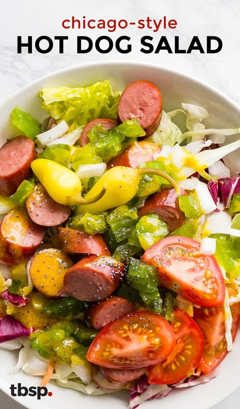 The infamous loaded hot dog just got a fresh makeover. Tossed with honey-mustard dressing in a bowl with all of the toppings (pickles, banana peppers, onion, and tomatoes) you won't believe how good your beloved Chicago dog is sans bun. Hot Dog Salad, Healthy Hot Dog, Chicago Style Hot Dog, Chicago Hot Dog, Low Carb Salad, Hot Dog Recipes, Chicago Food, Main Dish Salads, Stuffed Banana Peppers