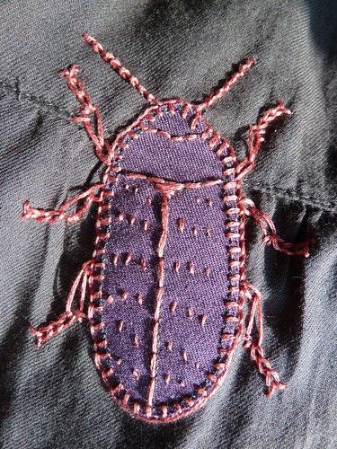 Purple beetle | purple denim applique, crushed rose stranded… | Flickr Beetle Applique, Embroidery Beetle, Purple Beetle, Coral Stitch, Insect Embroidery, Denim Applique, Buttonhole Stitch, Purple Denim, Bug Art