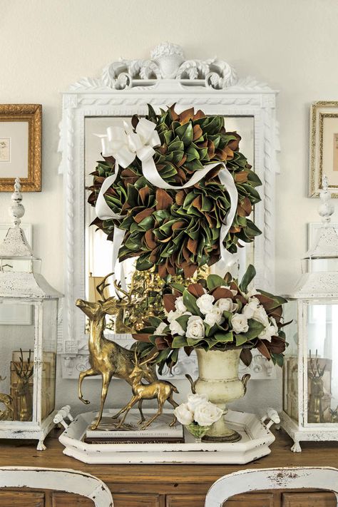 Cover Every Bare Surface - 29 Ways to Celebrate a Southern Christmas - Southernliving. Cover everything else with pine, magnolia, and red velvet bows. Undecorated surfaces at Christmastime make Southerners nervous. Wreath On Mirror, Magnolia Christmas Decor, Magnolia Decor, Southern Christmas, Christmas Spectacular, Holiday Greenery, Country Christmas Decorations, Magnolia Wreath, Magnolia Leaves