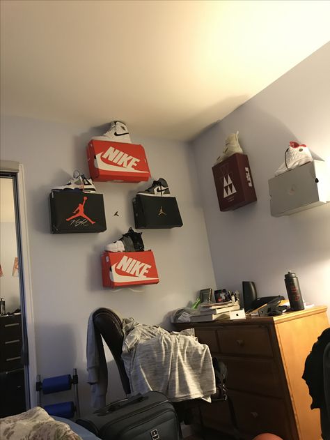 How to decorate your room with shoe boxes Shoe Display With Boxes, How To Put Shoe Boxes On The Wall, Room With Shoes On The Wall, Show Boxes On Wall, Nike Boxes On Wall, Shoe Box Room Decor, Shoes Boxes On Wall Decor, Shoe Box On Wall, Shoe Box Shelves