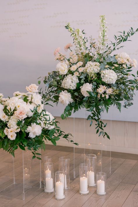 Clear Pillars Wedding Ceremony, Wedding Flower Floor Arrangements, Pedestal Flower Arrangements Wedding, Wedding Pedestals Ceremony, Alter Arrangements, Altar Flowers Wedding, Floral Pedestal, Realistic Wedding, Altar Arrangements