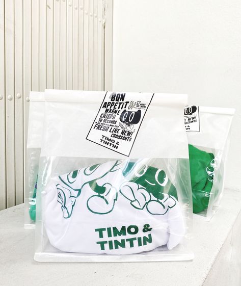 TIMO & TINTIN – Brand Identity, Packaging & Design Consultant – Dinsor Co., Ltd. Cool Clothing Packaging, Branded Merchandise Ideas Products, Streetwear Packaging, Brand Merchandise Ideas, Merch Branding, T Shirt Packaging, Brand Packaging Design, Packaging Design Trends, Tshirt Packaging