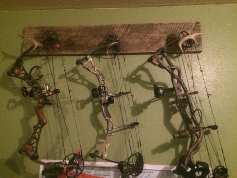 Bow holder I made out of cypress wood. Hanging Bow And Arrow On Wall, Hunting Bow Holder Diy, Hunting Bow Storage Ideas, Bow Hanger Archery, Bow And Arrow Holder Diy, Bow And Arrow Rack, Compound Bow Holder Diy, Diy Compound Bow Holder, Archery Bow Holder