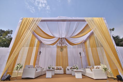 There is beauty in symmetry.  Canopy, wedding seating, wedding decor ideas, beige - mustard setup Shamiyana Decoration, Shamiyana Tent, Food Counter Decor Wedding, Stage Decoration Photos, Gazebo Wedding Decorations, Pandal Decoration, Arabian Party, Canopy Wedding, Seating Wedding